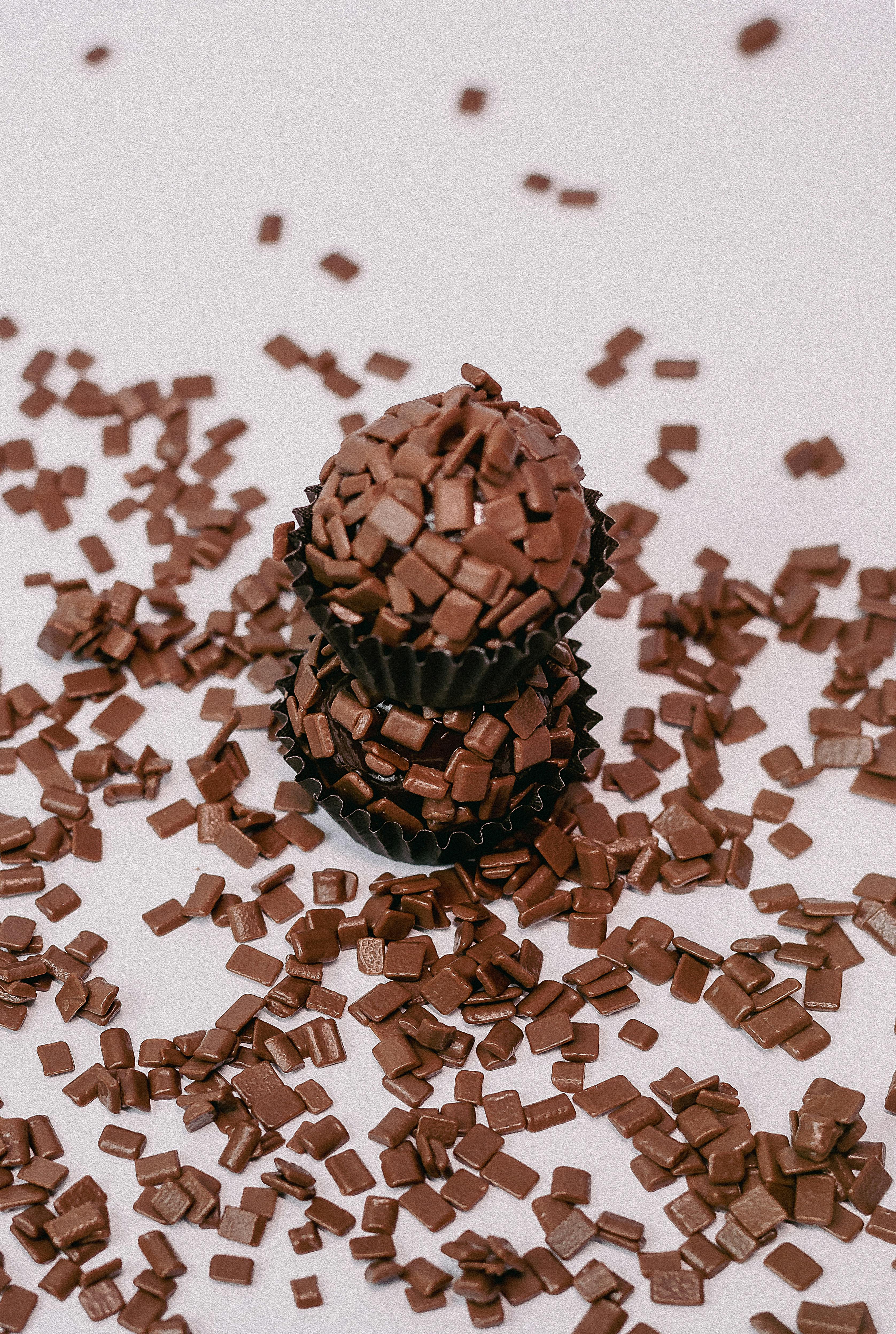 Mini chocolate chunks symbolizing the delicious flavour of nuwave chocolate whey protein isolate powder