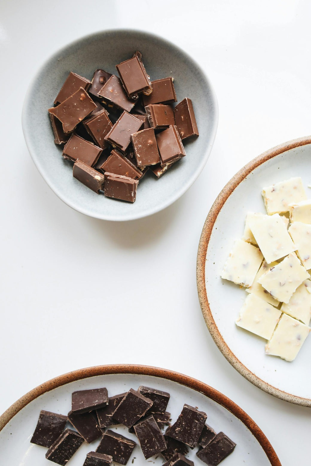 Chocolate chunks symbolizing the delicious flavours of nuwave vanilla and chocolate whey protein isolate powders