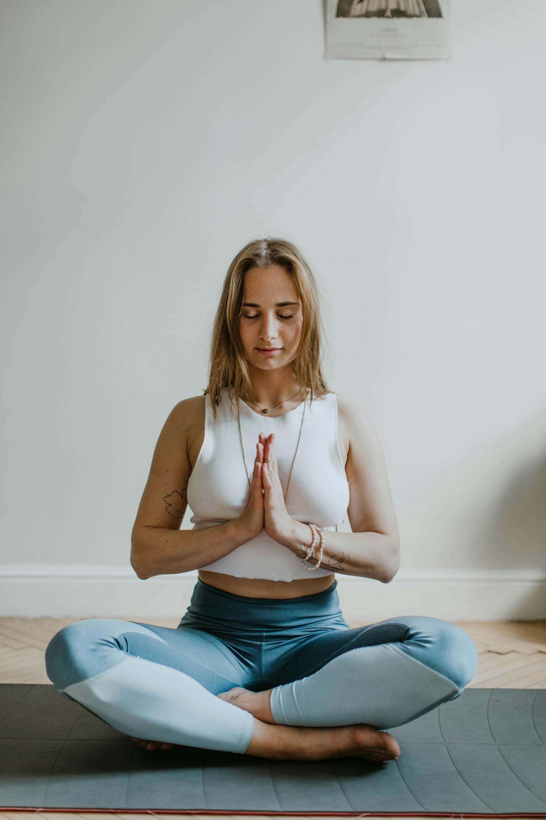 Woman doing yoga sybolizing the healthy active lifestyle that nuwave products support