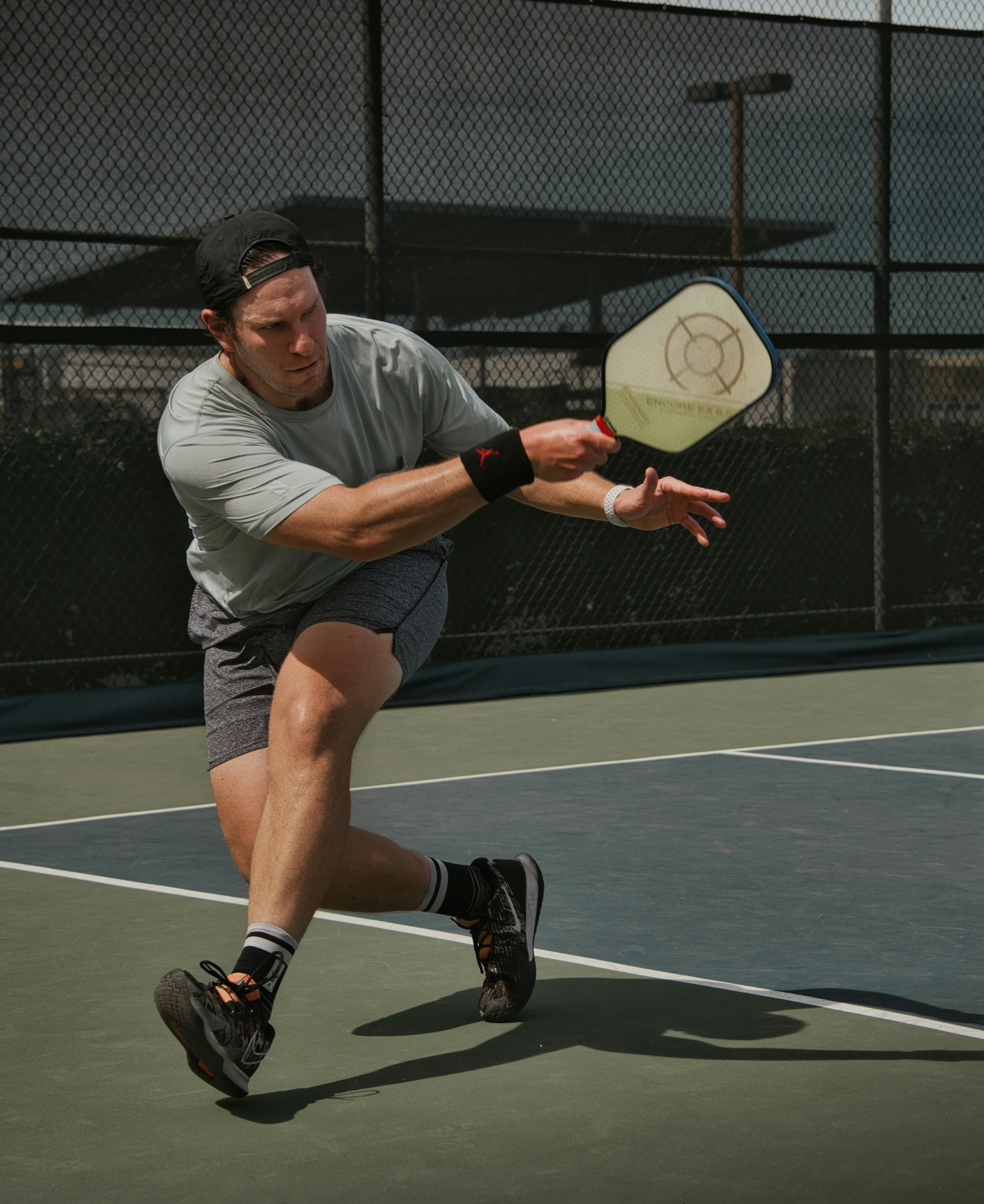 Man playing pickleball showing the healthy active lifestyle that nuwave products support