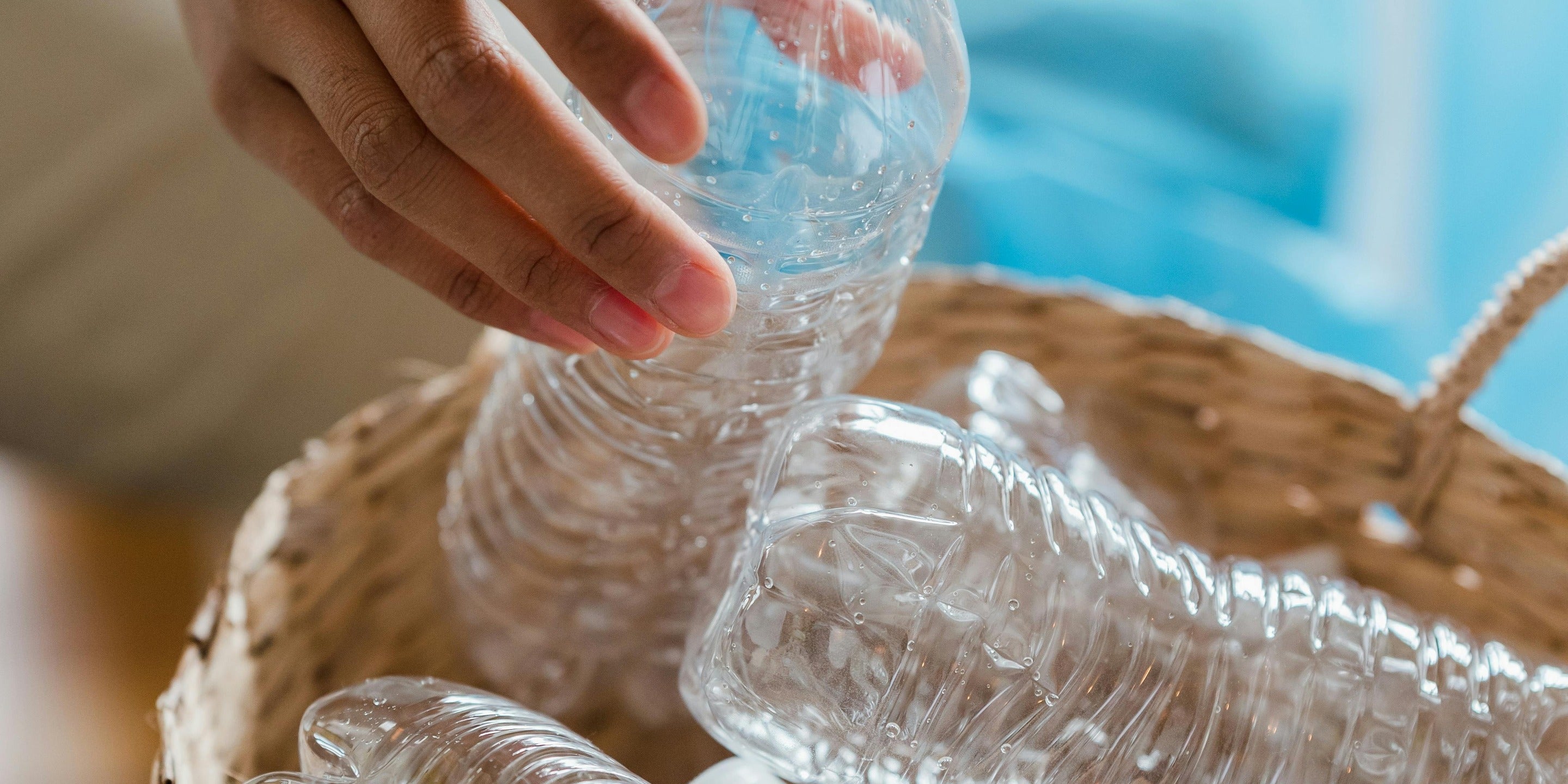 Empty water bottles showing nuwave's commitment to plastic cleanup in partnership with RePurpose Global